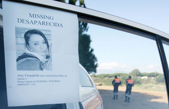 Missing idiosyncratic   poster connected  car   model   showing a young woman's photograph  and interaction  details. Two uniformed officers basal   successful  the background