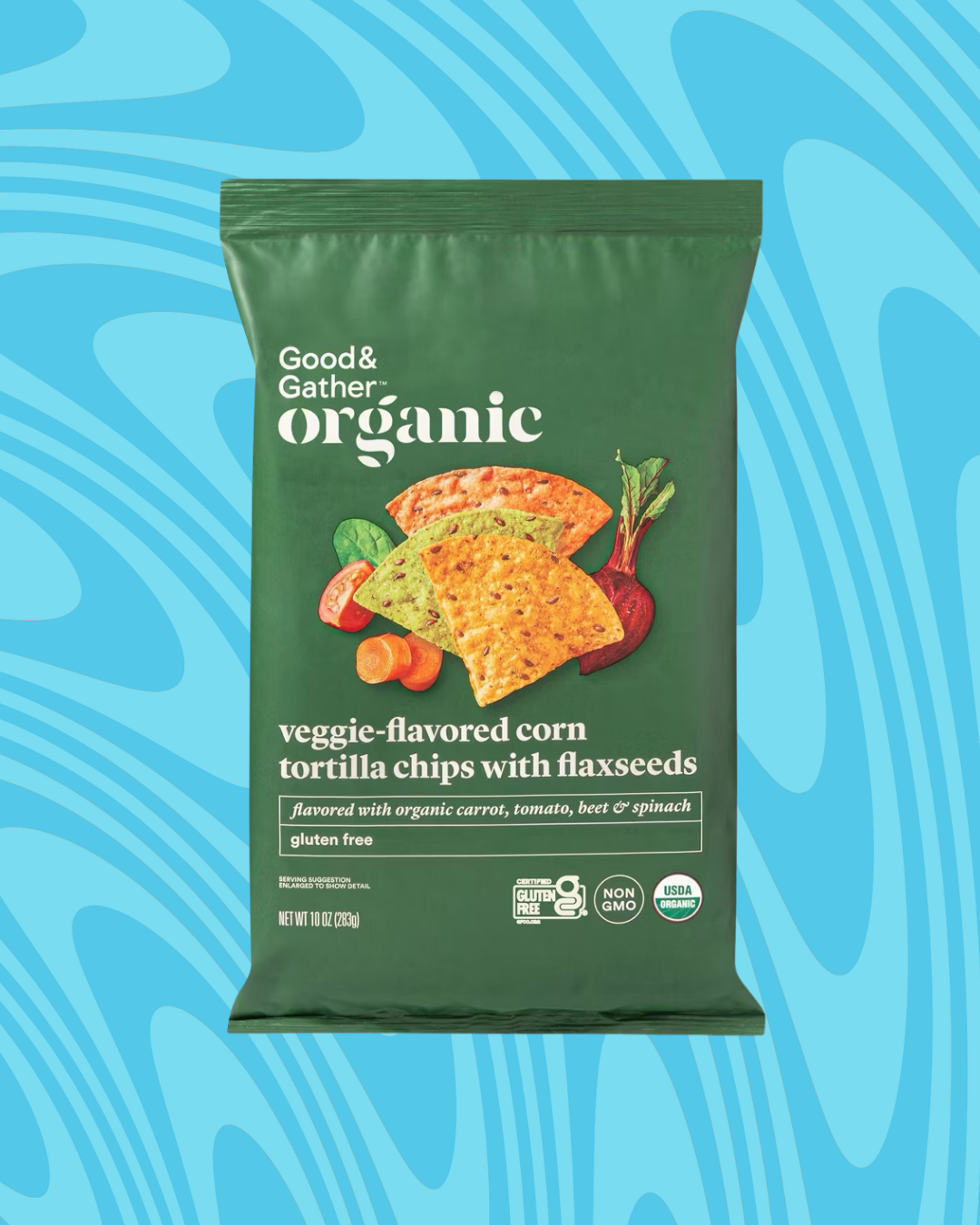 A green bag of Good &amp;amp; Gather organic veggie-flavored corn tortilla chips with flaxseeds, featuring illustrations of carrots and tomatoes