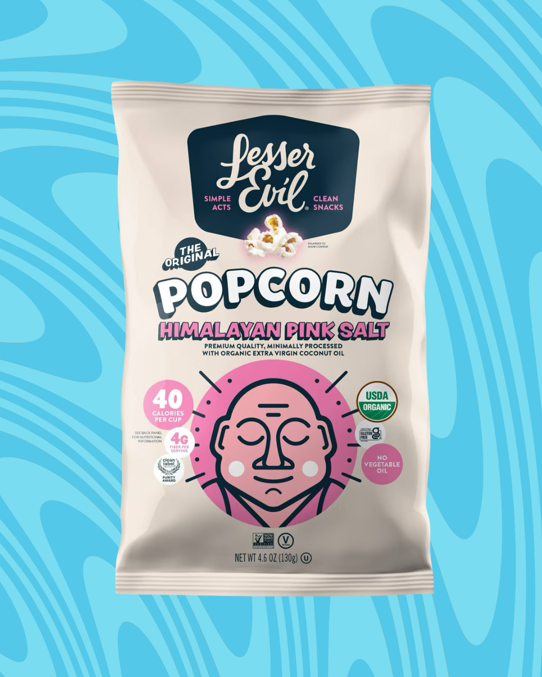 Bag of Lesser Evil Himalayan Pink Salt popcorn with organic coconut oil on a blue swirled background
