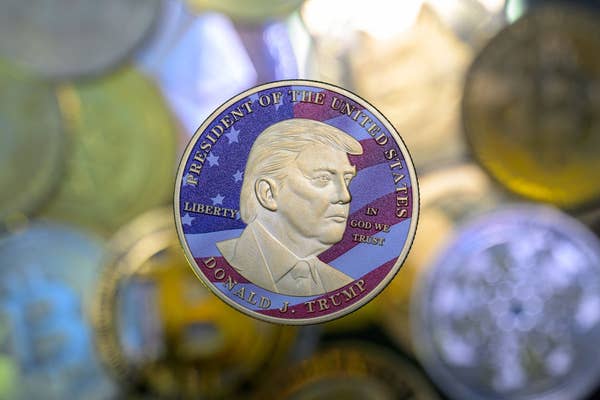 Coin featuring a side profile of a man's face, with text reading "President of the United States" and "Donald J. Trump."