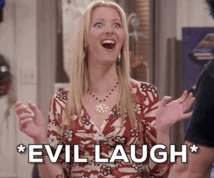 A pistillate   laughing with her hands raised, wearing a patterned dress. Overlay substance   reads "*EVIL LAUGH*"