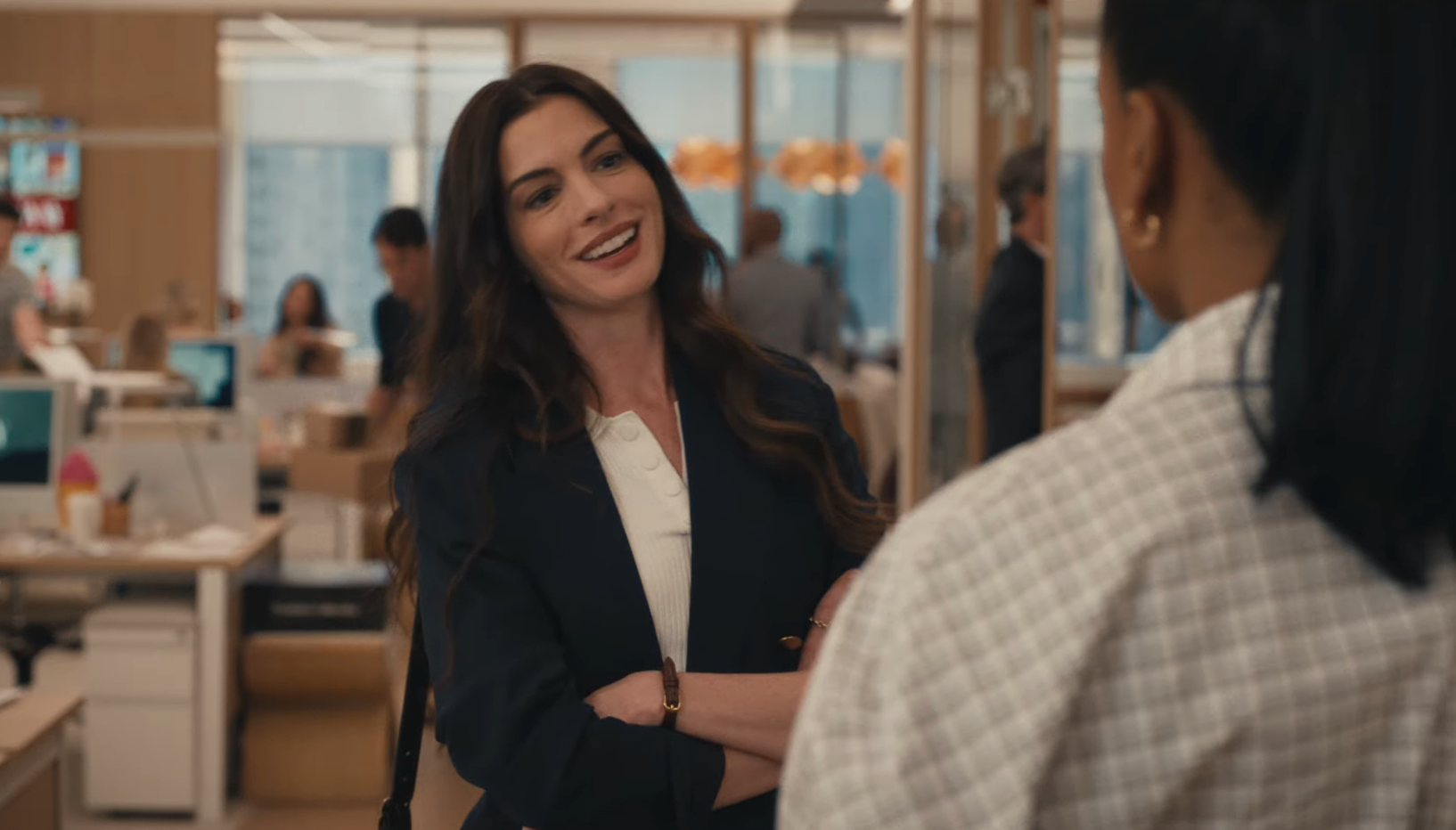 Two characters from a TV amusement   are having a speech  successful  an bureau   setting, 1  wearing a blazer, the different   successful  a quilted jacket