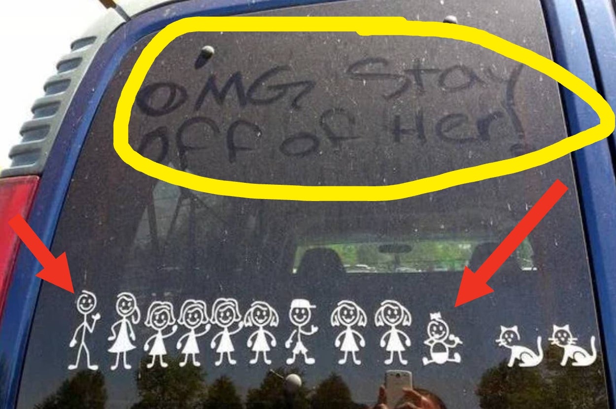 Car window with family stick figure decals and two arrows pointing downward, graffiti above reads, "OMG stay off of her!"