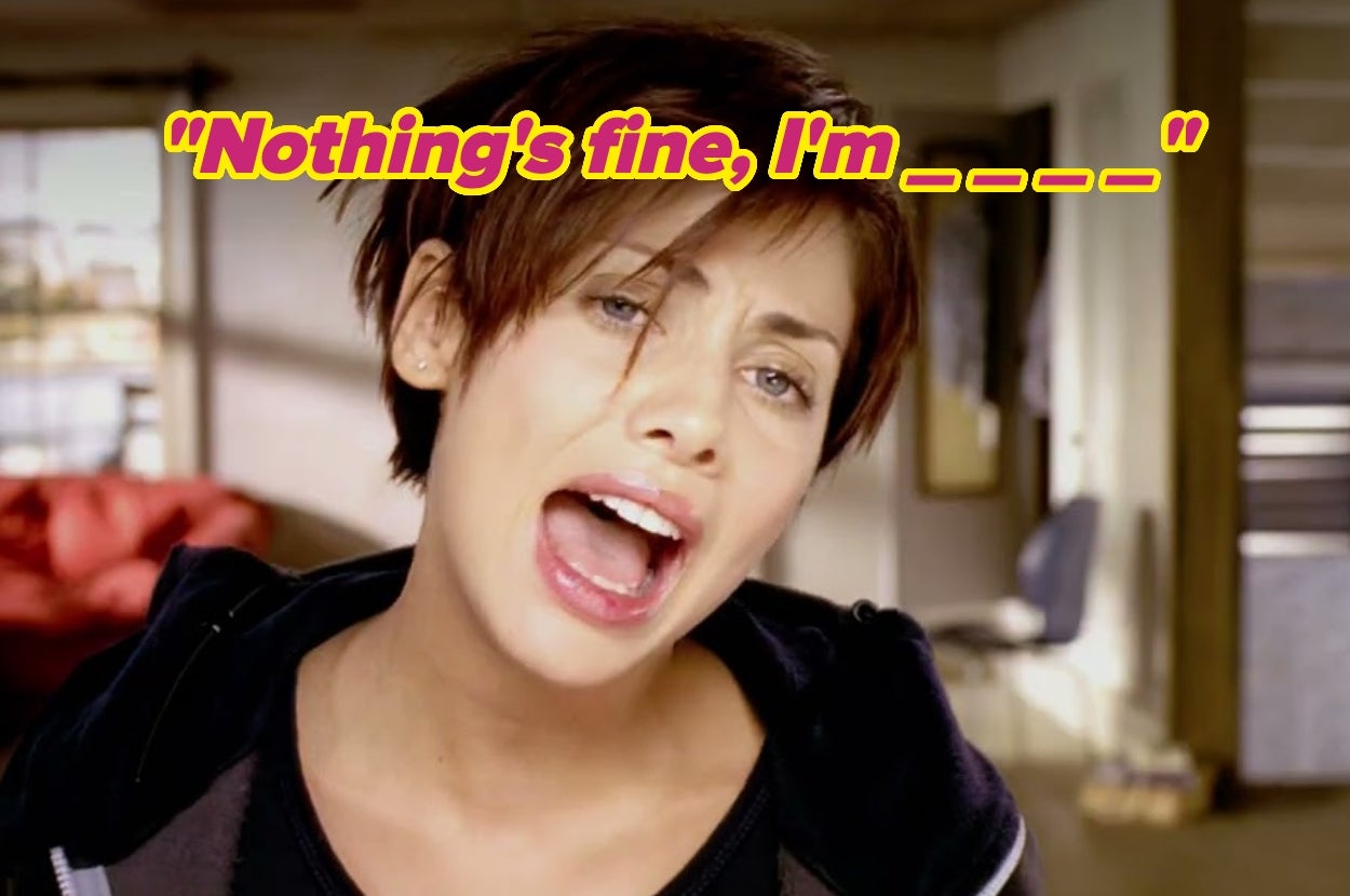 Person singing indoors with text above that says: "Nothing's fine, I'm ___"