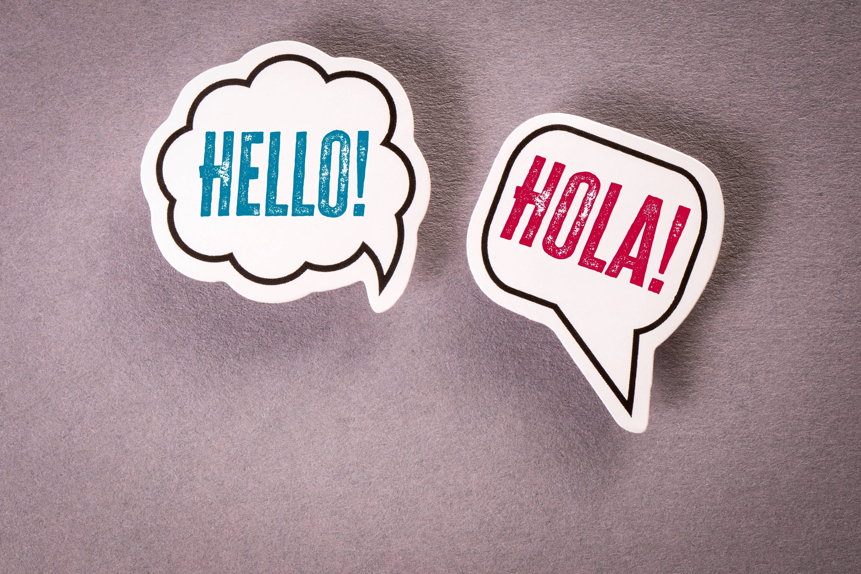 Speech bubbles: "Hello!" and "Hola!" Text: "Even a gringo can pass this Spanish vocab quiz."