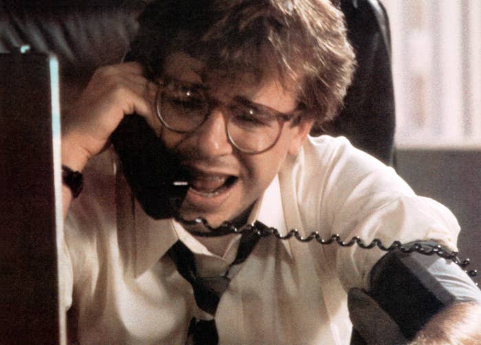 Rick Moranis talking connected  the phone