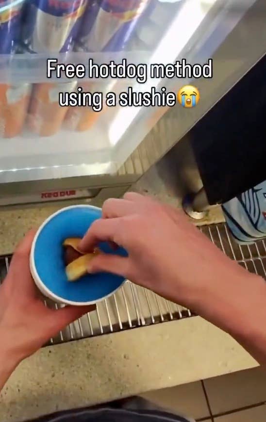 Person placing a hotdog into a cup filled with a slushie, caption reads: "Free hotdog method using a slushie" with crying emoji
