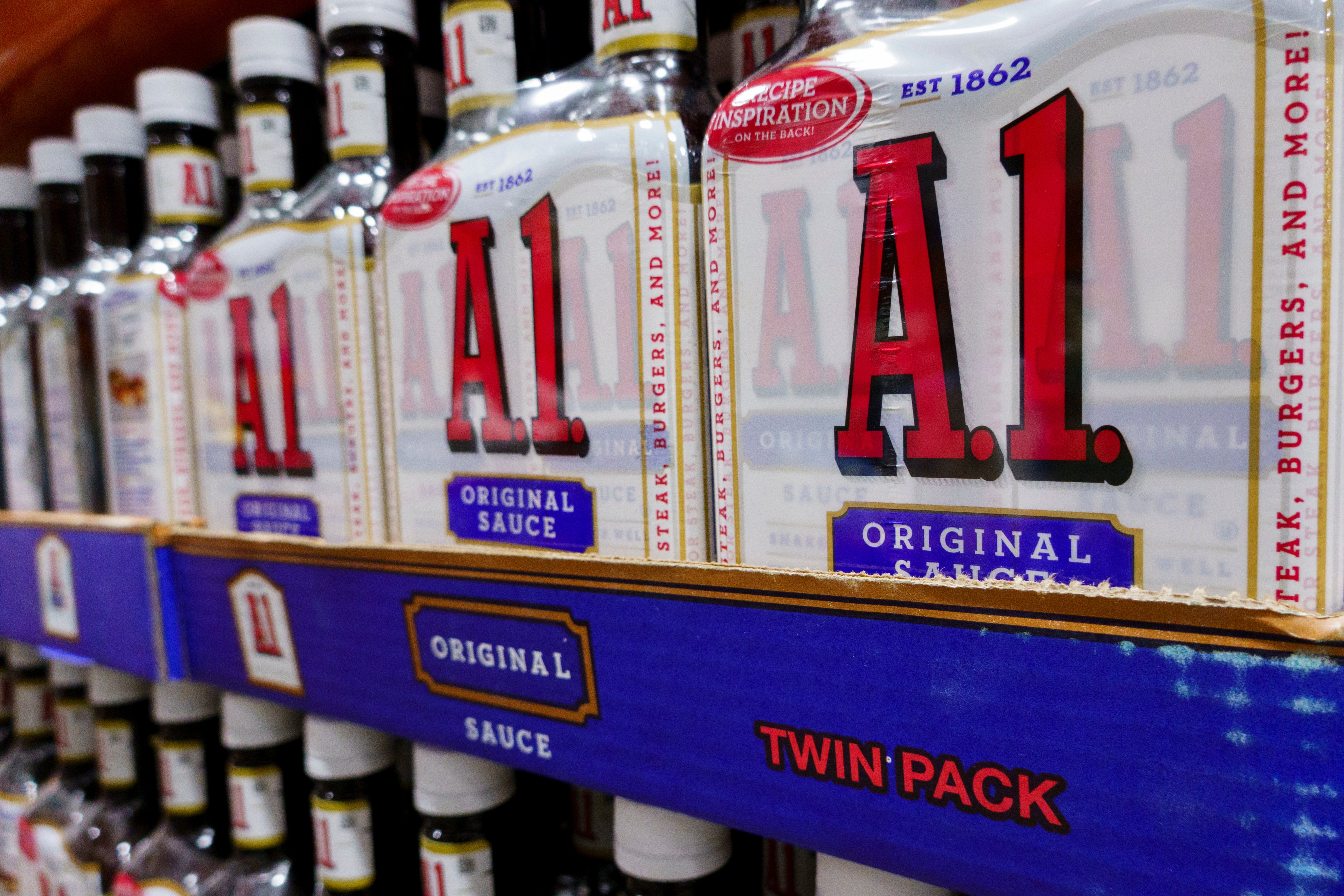 Bottles of A.1. Original Sauce displayed connected a store support with "Original Sauce" and "Twin Pack" labels visible