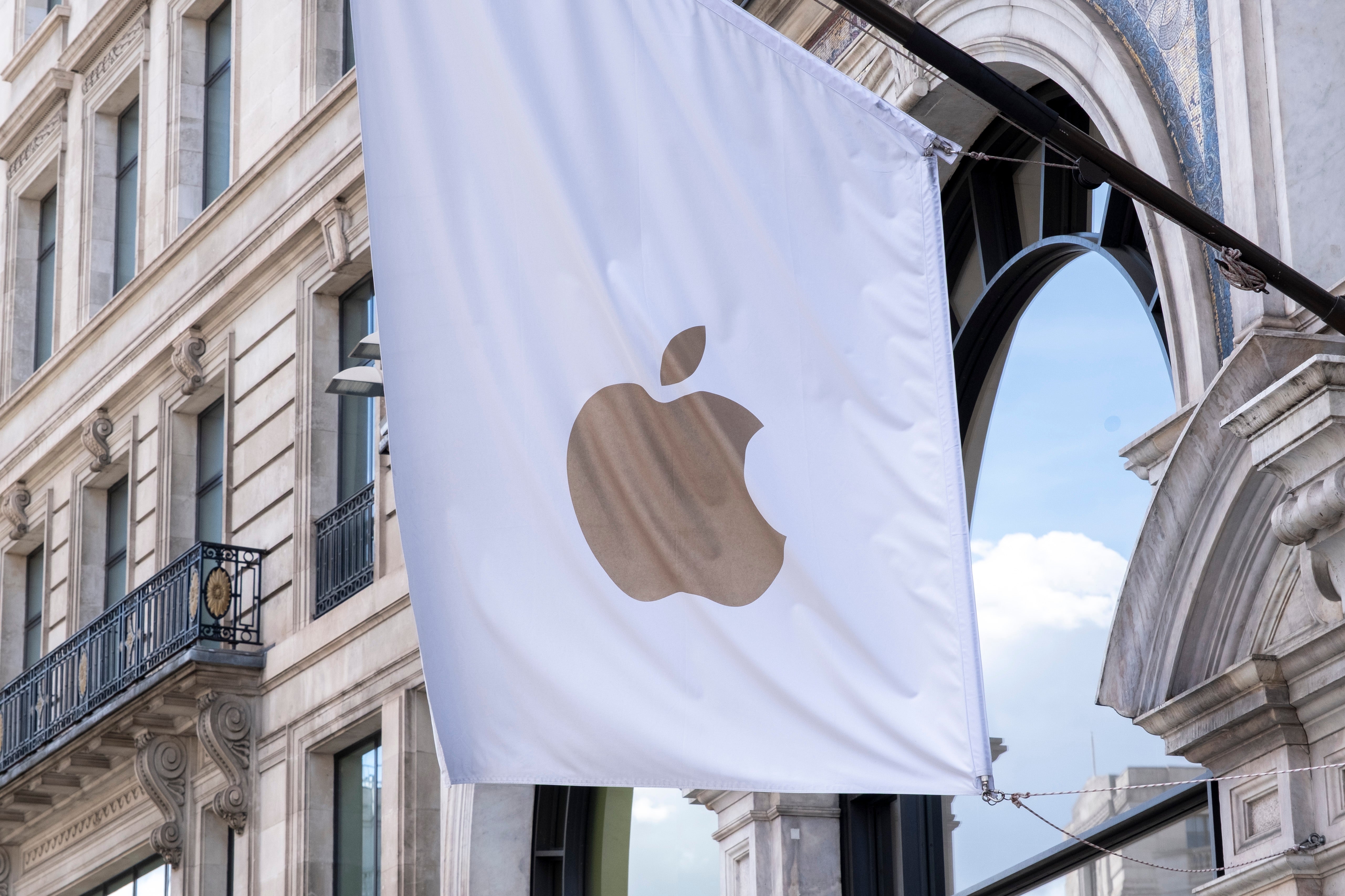 Apple store exterior with a ample Apple logo flag, situated successful a humanities gathering area