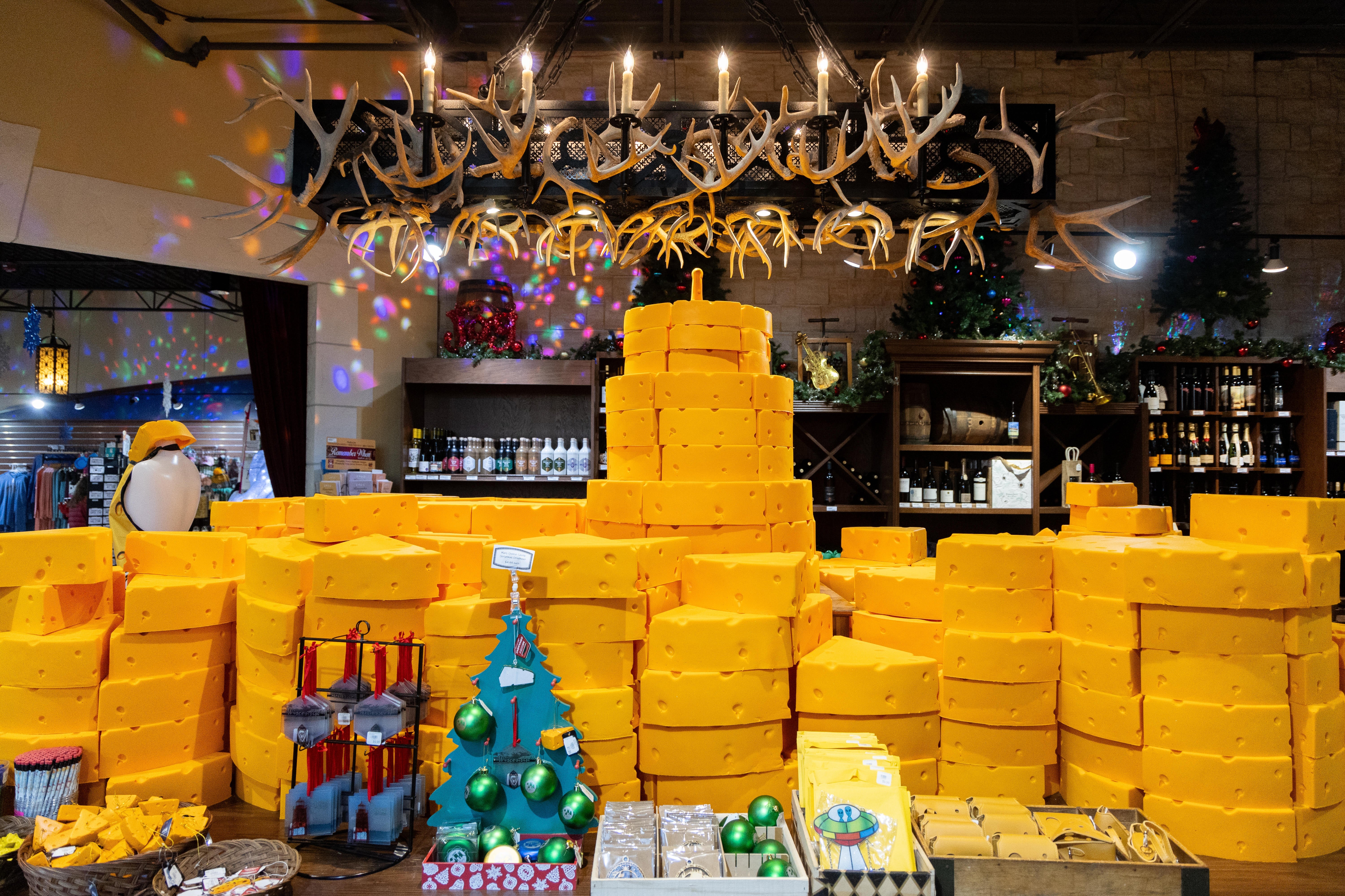 Stacks of food blocks arranged decoratively wrong a shop, with vacation lights creating a festive ambiance