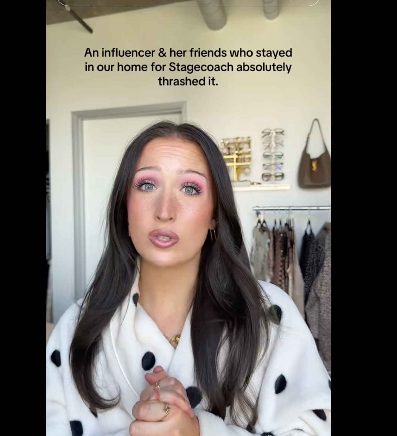 Person discussing harm  caused by influencer guests astatine  their home. Clothing rack disposable   successful  the background