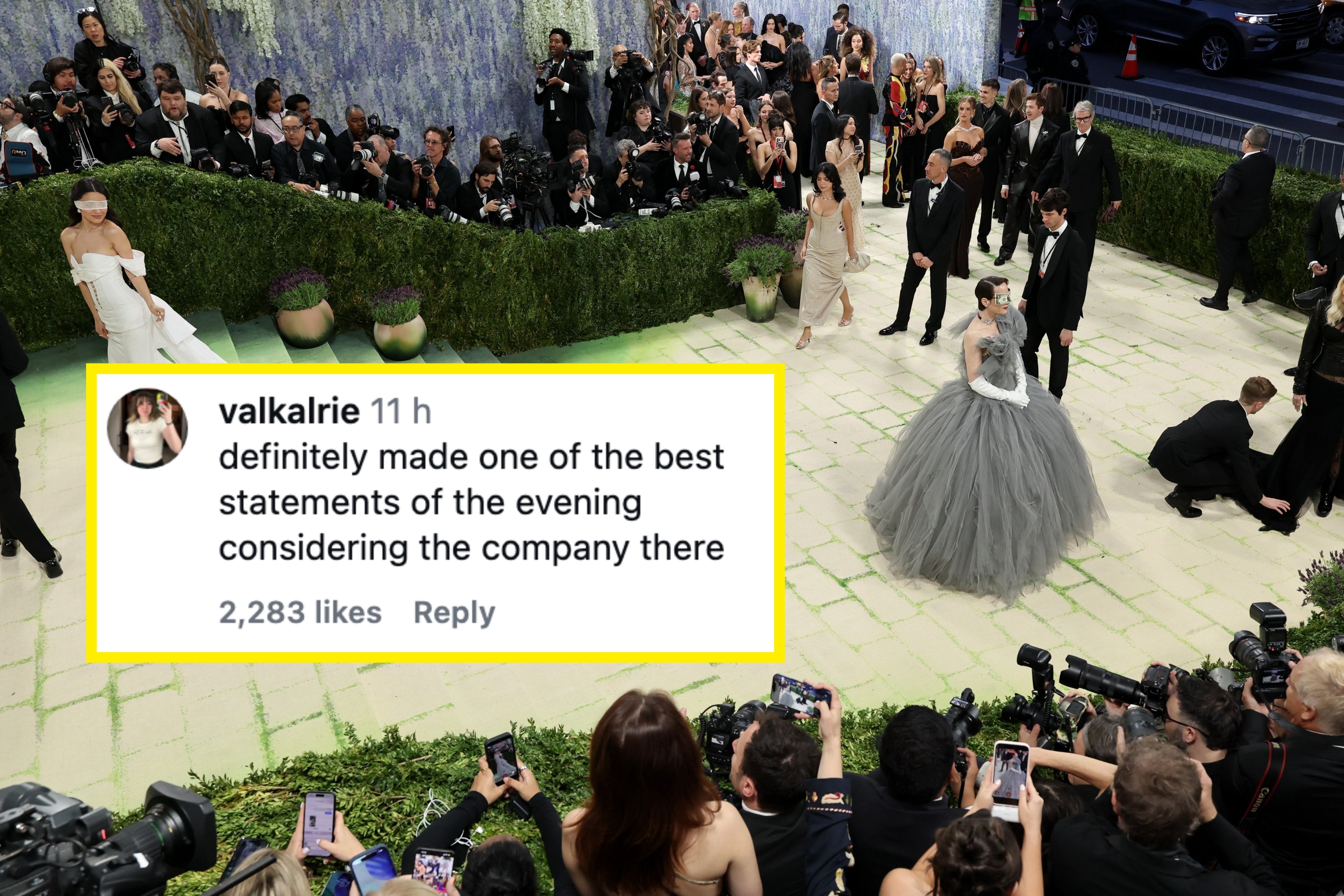 Celebrities successful  ceremonial  attire astatine  a high-profile event, with media capturing the scene. One idiosyncratic   wears a dramatic, flowing achromatic  gown