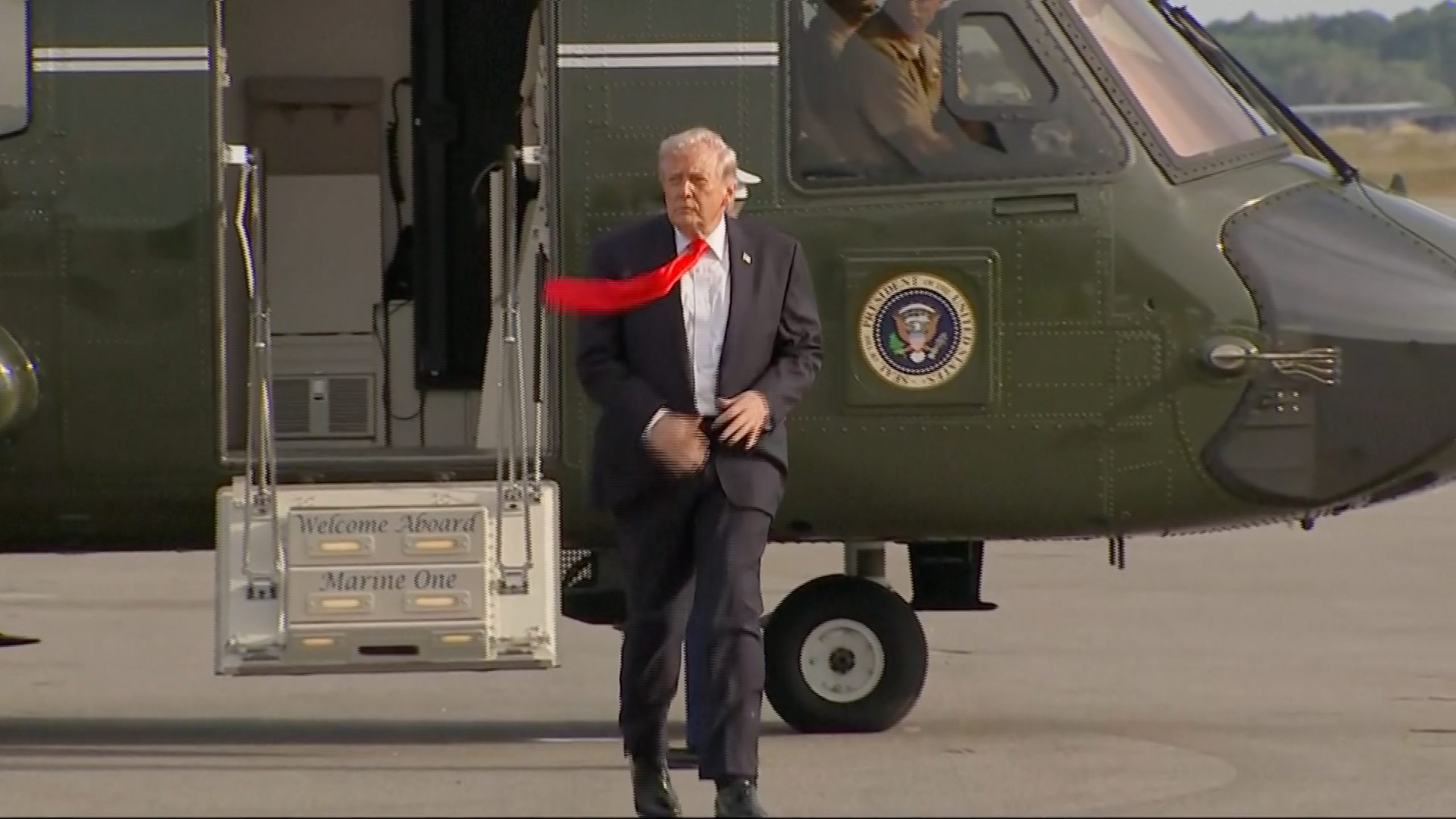 Person exiting subject   helicopter, with "Welcome Aboard Marine One" motion   visible
