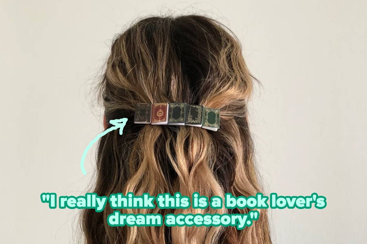 Hair accessory styled as miniature books, with text overlay: "I really think this is a book lover's dream accessory."