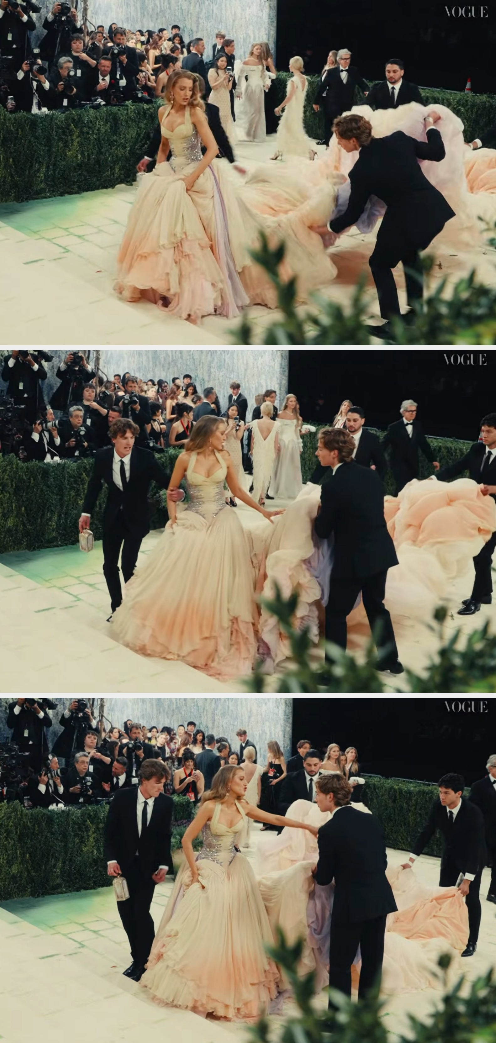 Blake successful  an elegant gown walking connected  a reddish  carpet, assisted by attendants holding the formal  train
