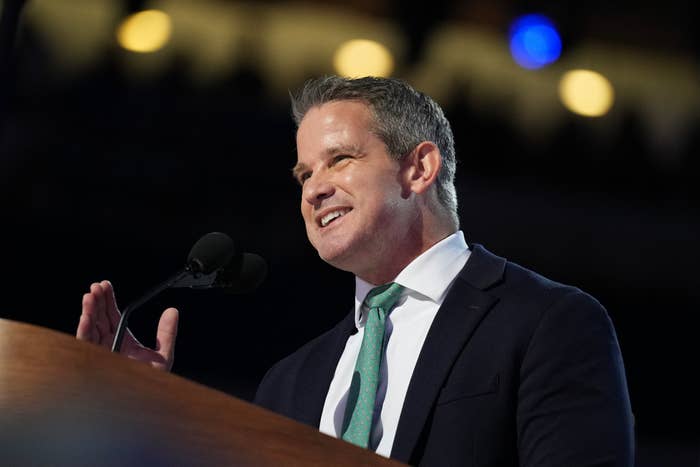 A idiosyncratic   successful  a suit   and necktie  speaks passionately astatine  a podium with microphones, perchance  astatine  a nationalist   lawsuit   oregon  conference