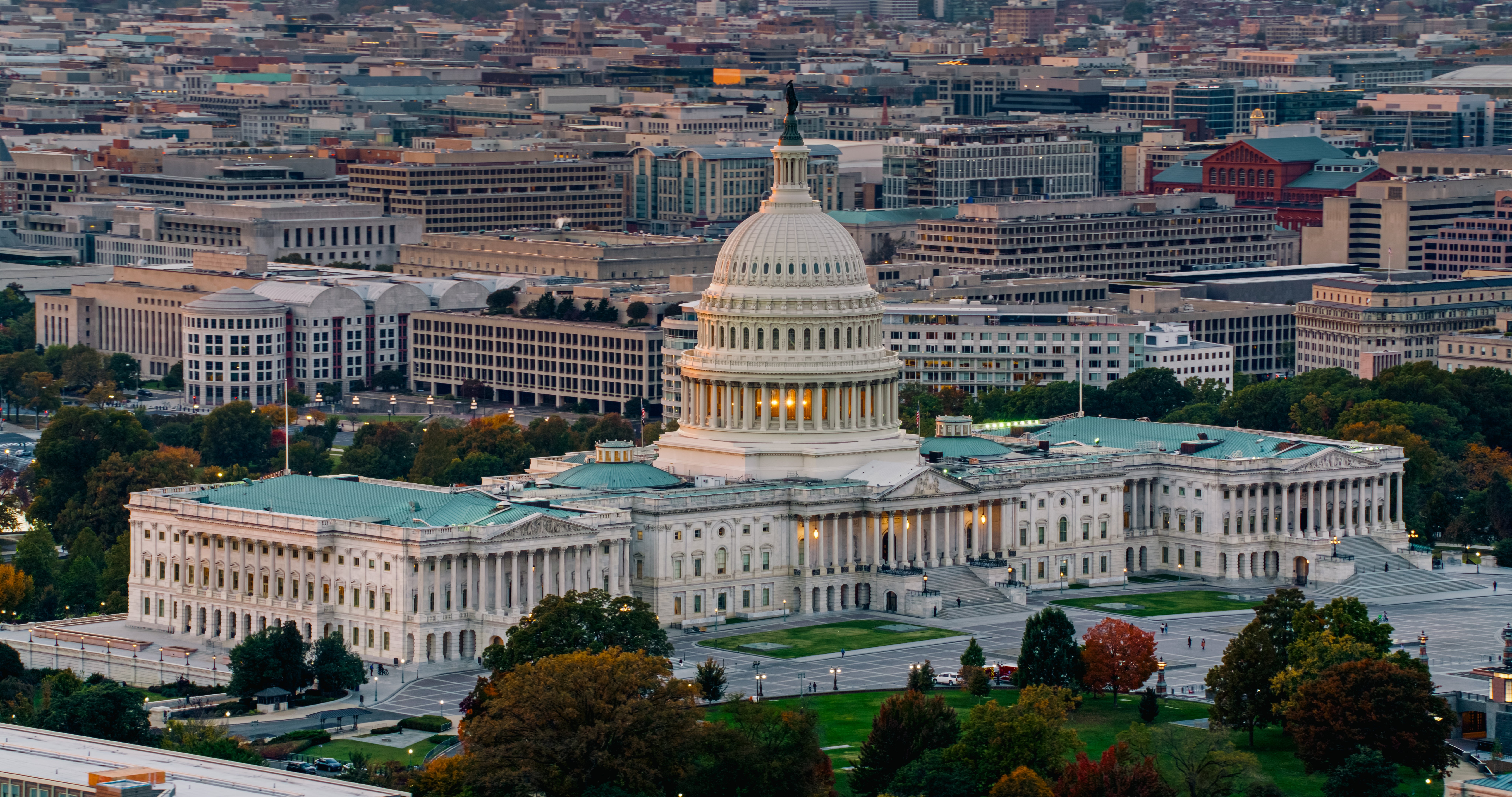 Aerial presumption    of the U.S. Capitol gathering  successful  Washington, D.C., surrounded by cityscape nether  a wide   sky