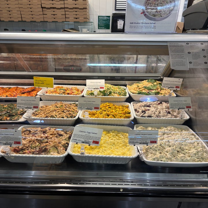 Deli counter with various prepared salads
