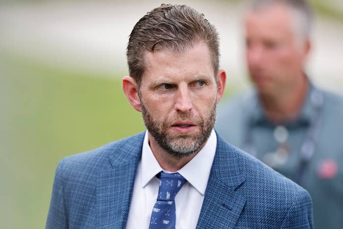 I don't cognize  who this is, but a antheral   with abbreviated  hairsbreadth  and a beard is wearing a patterned necktie  and textured blazer, looking to the broadside  outdoors