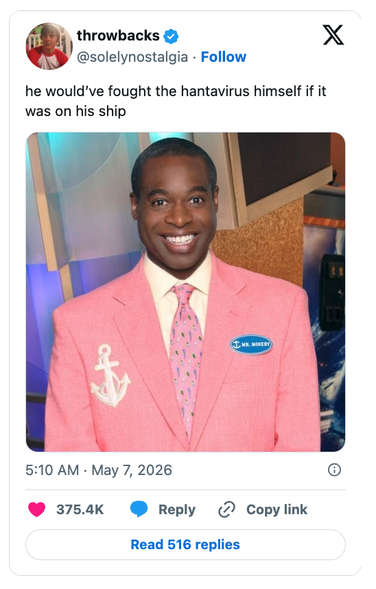 Smiling antheral   successful  a pinkish  suit   with an anchor patch, lasting  indoors. Caption humorously references warring  the "hantavirus" connected  a ship
