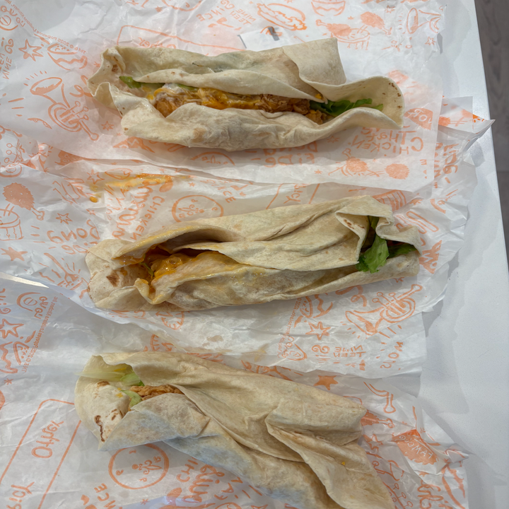 Three Popeyes chicken wraps