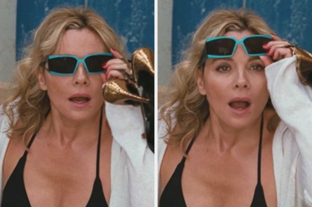 A woman in a black swimsuit and sunglasses looks surprised while holding a shoe. This image is likely related to travel or vacation themes