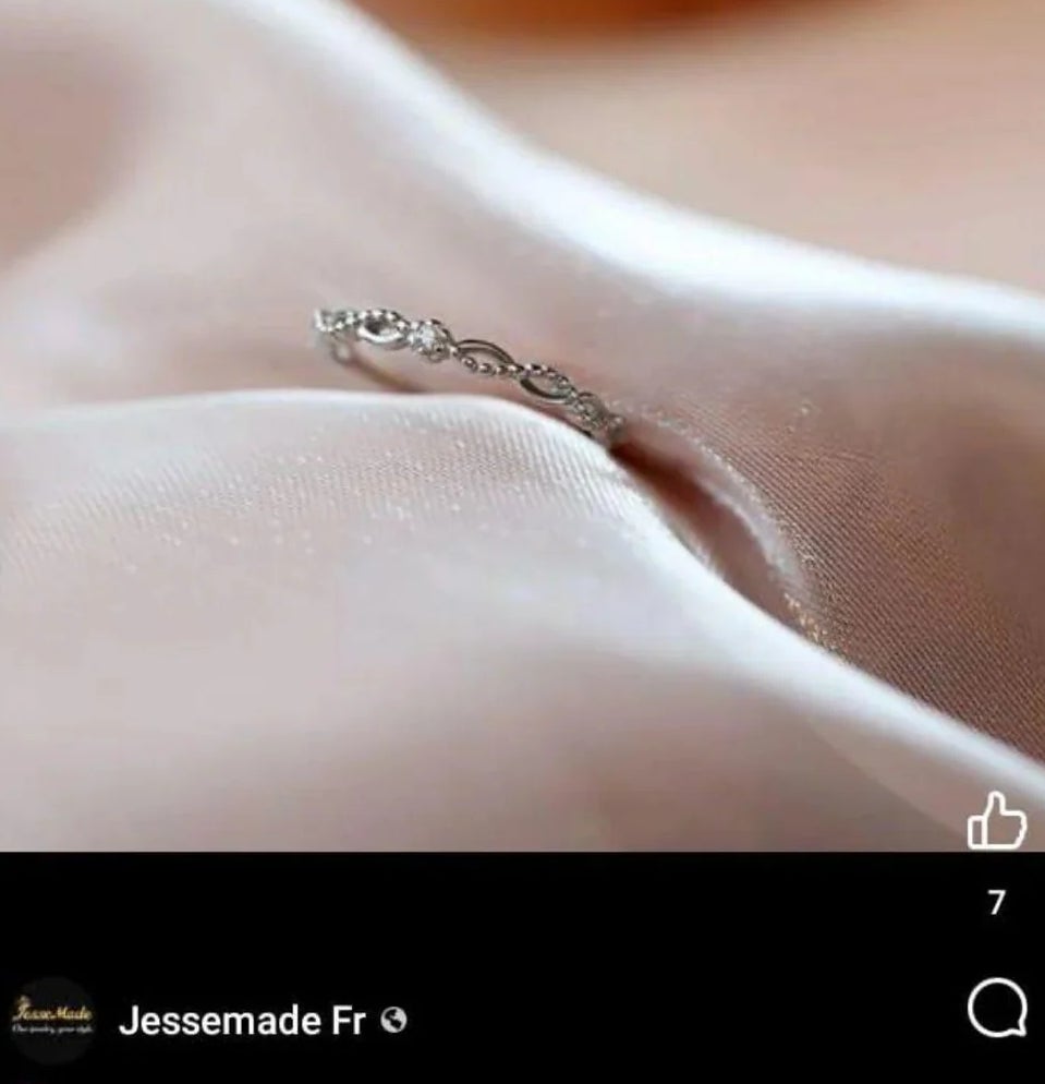 A delicate concatenation  bracelet lying connected  brushed  fabric, portion  of a personalized acquisition  proposition  station  connected  a societal  media platform