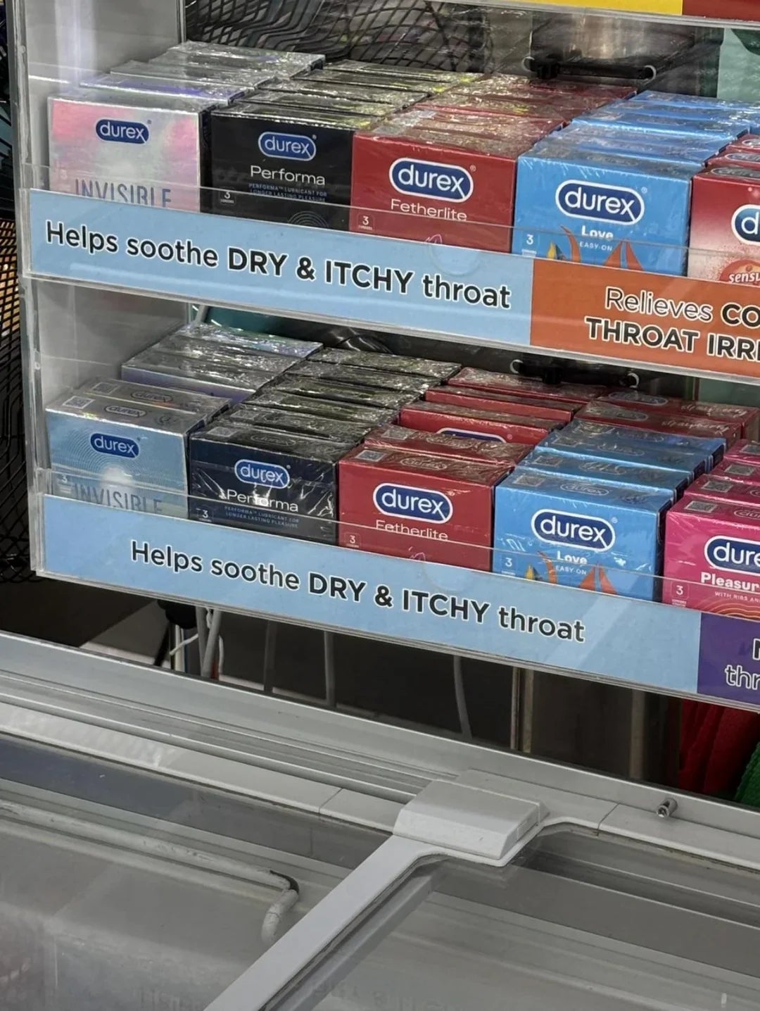 Condom show  astatine  a store   labeled with a motion   intended for pharynx  lozenges, stating "Helps soothe DRY &amp;amp; ITCHY throat."