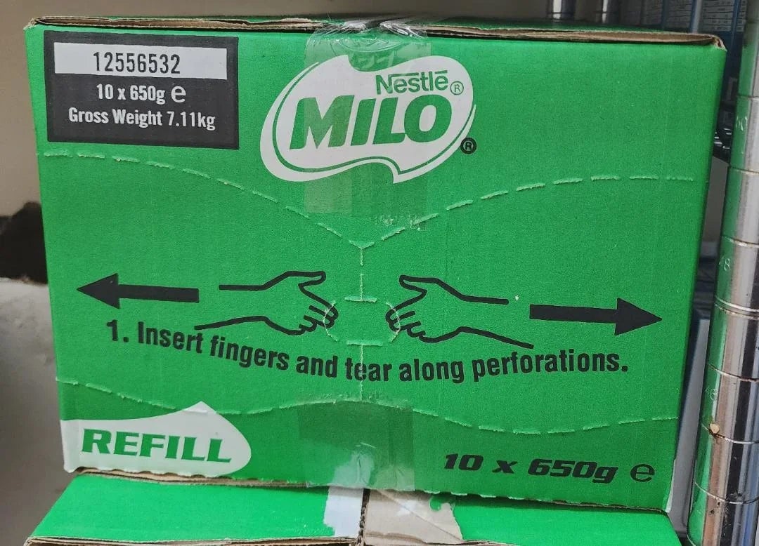 A greenish  Nestlé Milo container  instructs to insert fingers and teardrop  on  perforations for casual  opening