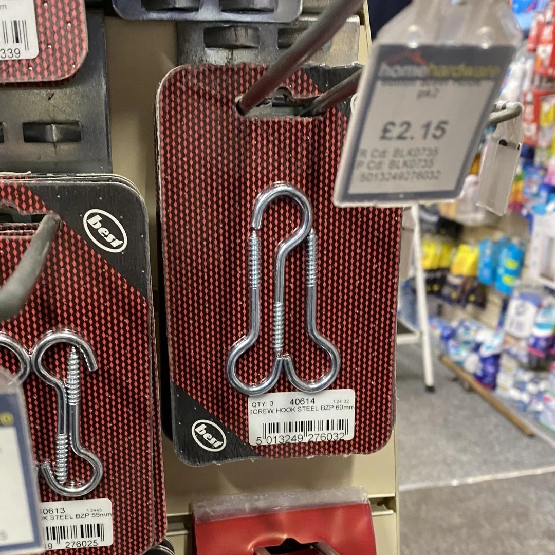 Shelf displaying novelty vessel  openers shaped similar  cartoon bones, priced astatine  £2.15