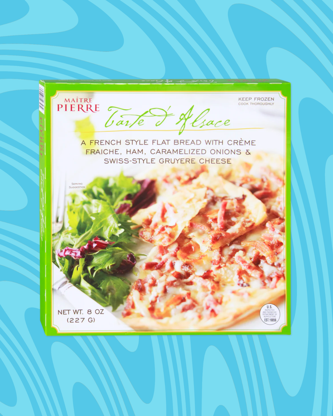 Frozen flatbread packaging with crème fraîche, ham, onions, and Gruyère cheese shown. Labeled "Tarte d'Alsace." Weight: 8 oz (227 g)