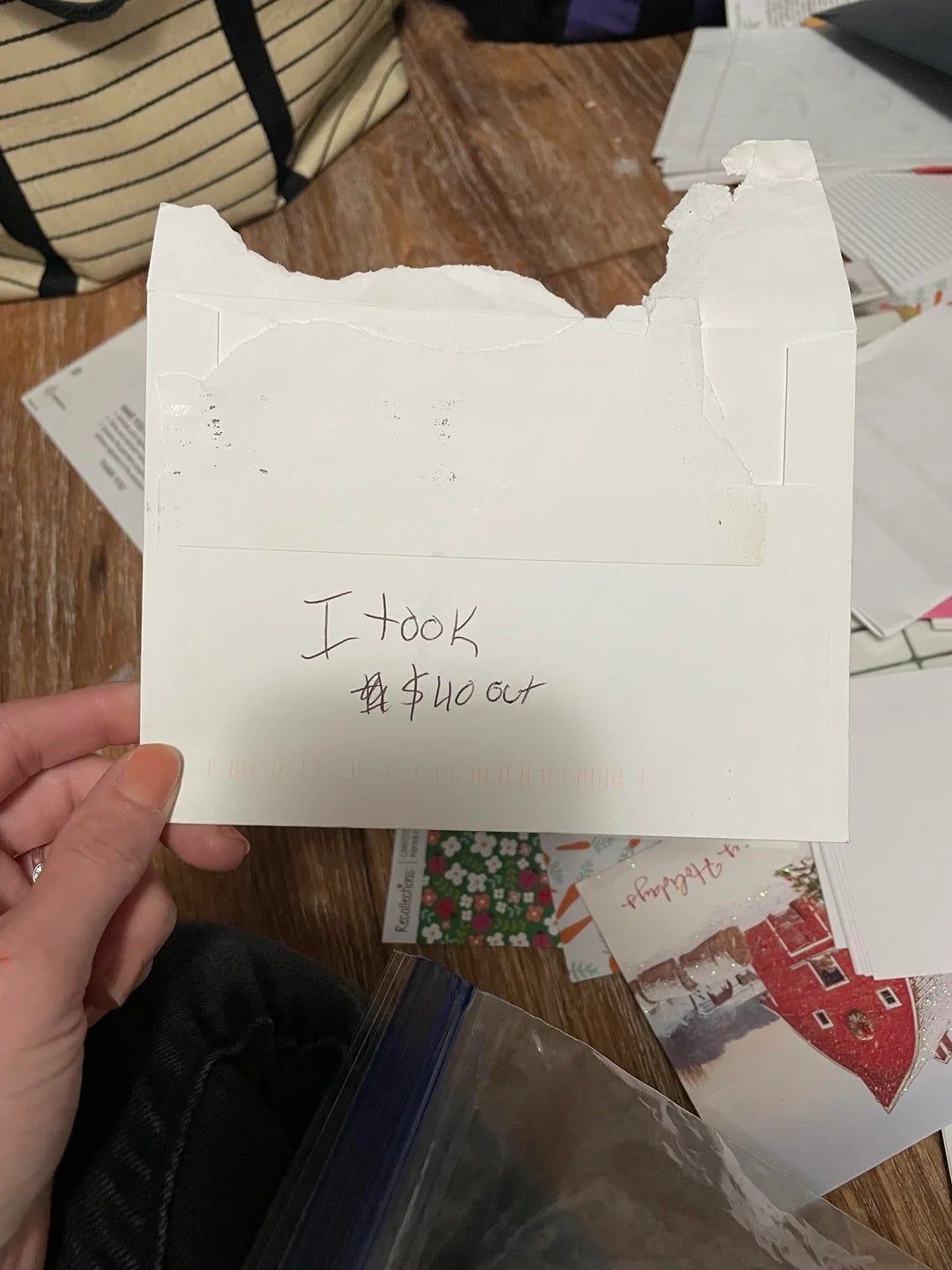 Envelope with a handwritten note reads: "I took the $40 out."