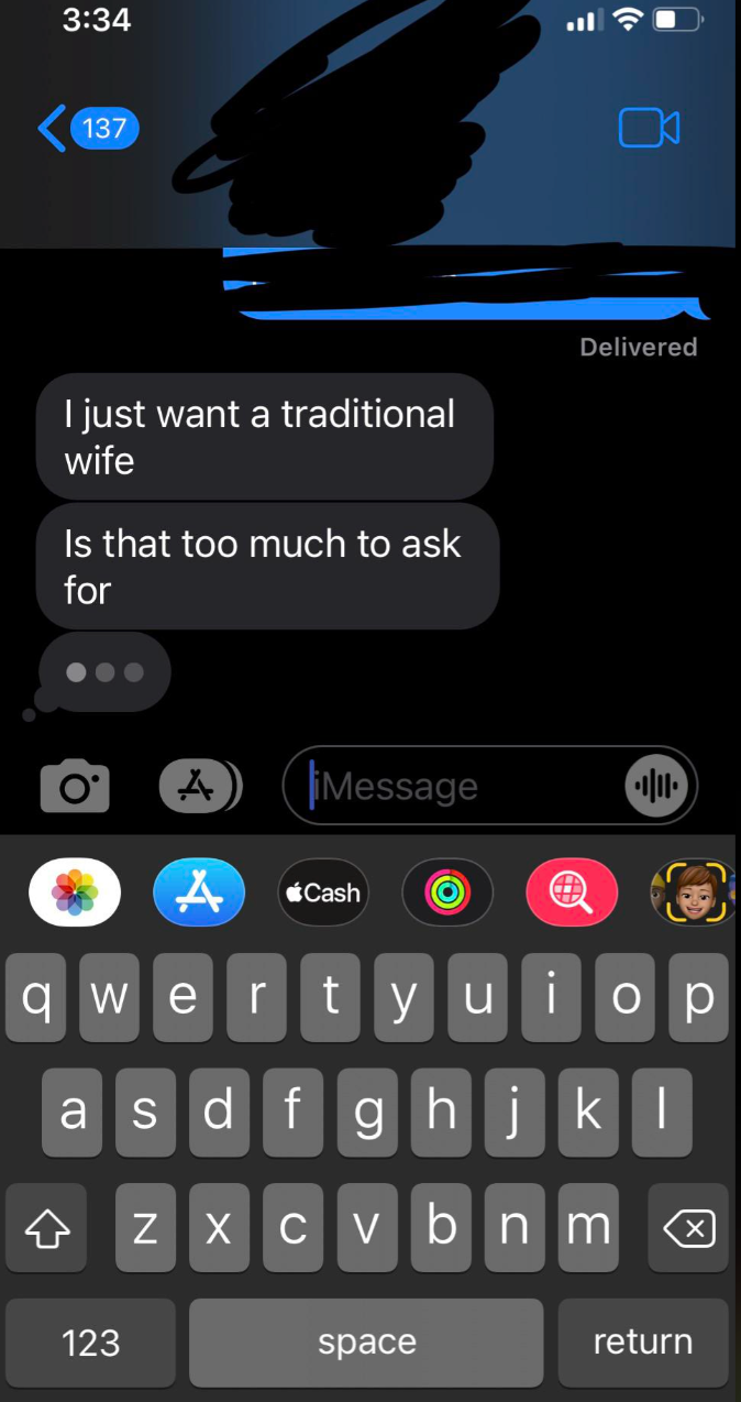 Text message on a phone screen says, "I just want a traditional wife. Is that too much to ask for."