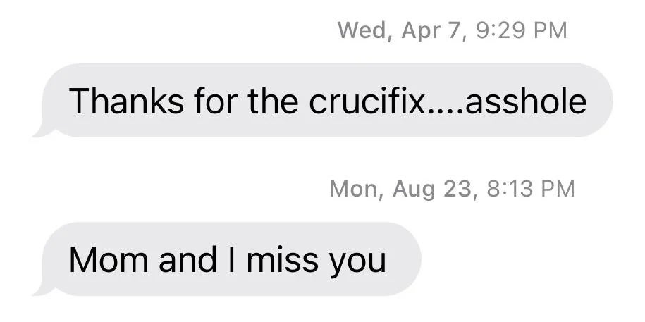 Text exchange: Sarcastic thank you for a crucifix, followed by a message saying "Mom and I miss you."