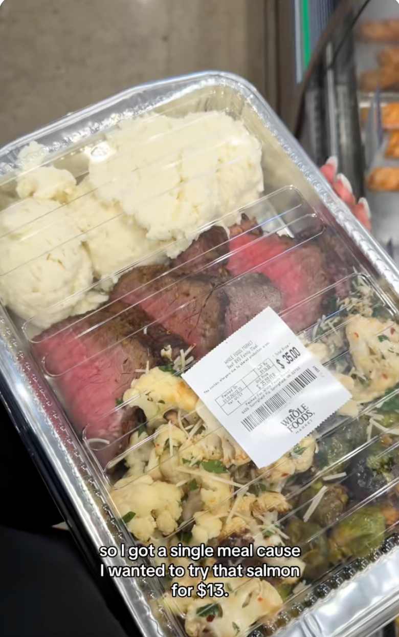 Prepared meal with mashed potatoes, roast beef, mixed vegetables, and a price tag of $15.99. Text: "So I got a single meal cause I wanted to try that salmon for $13."