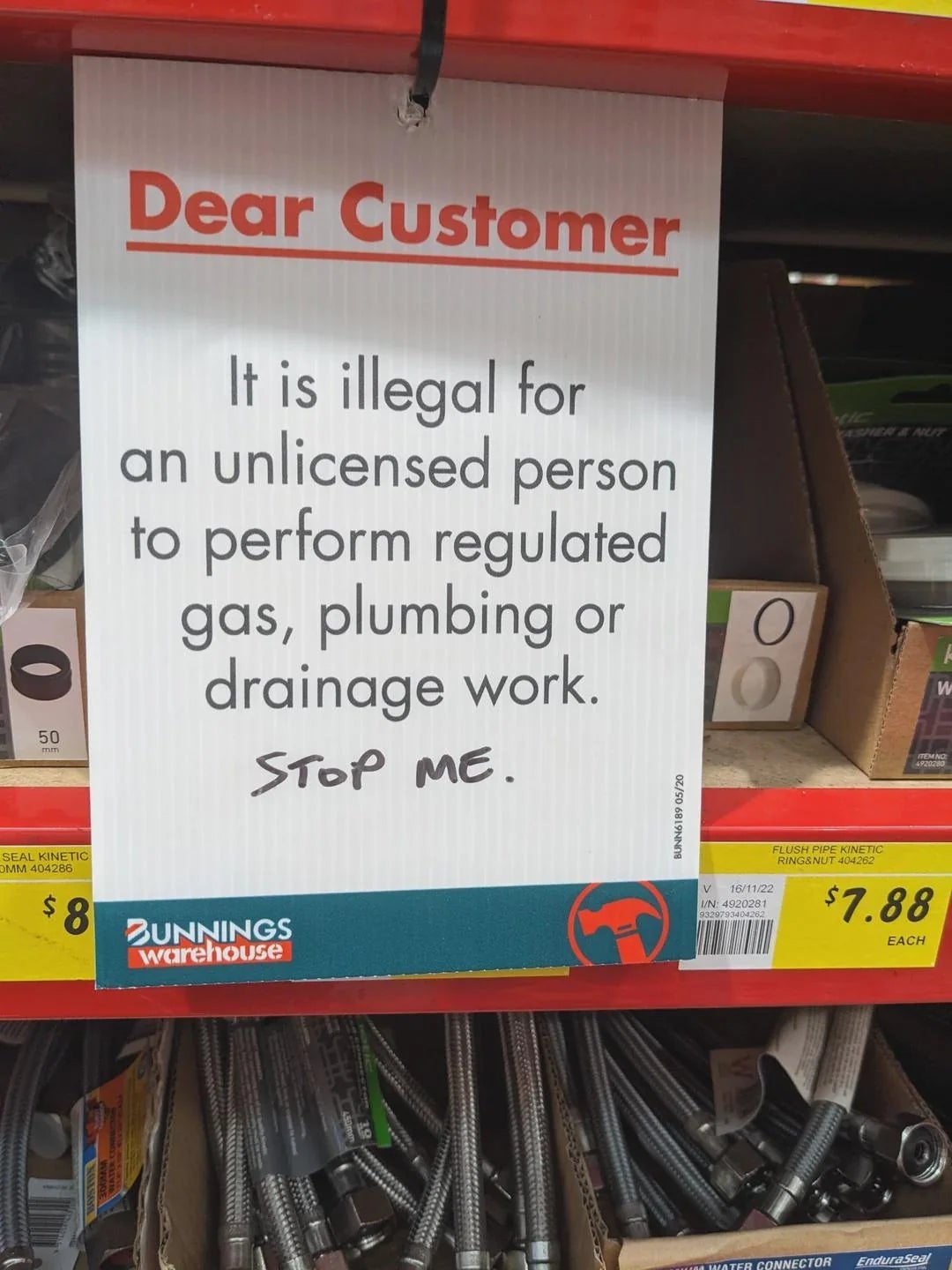 Sign at hardware store: Unlicensed individuals cannot perform regulated gas, plumbing, or drainage work
