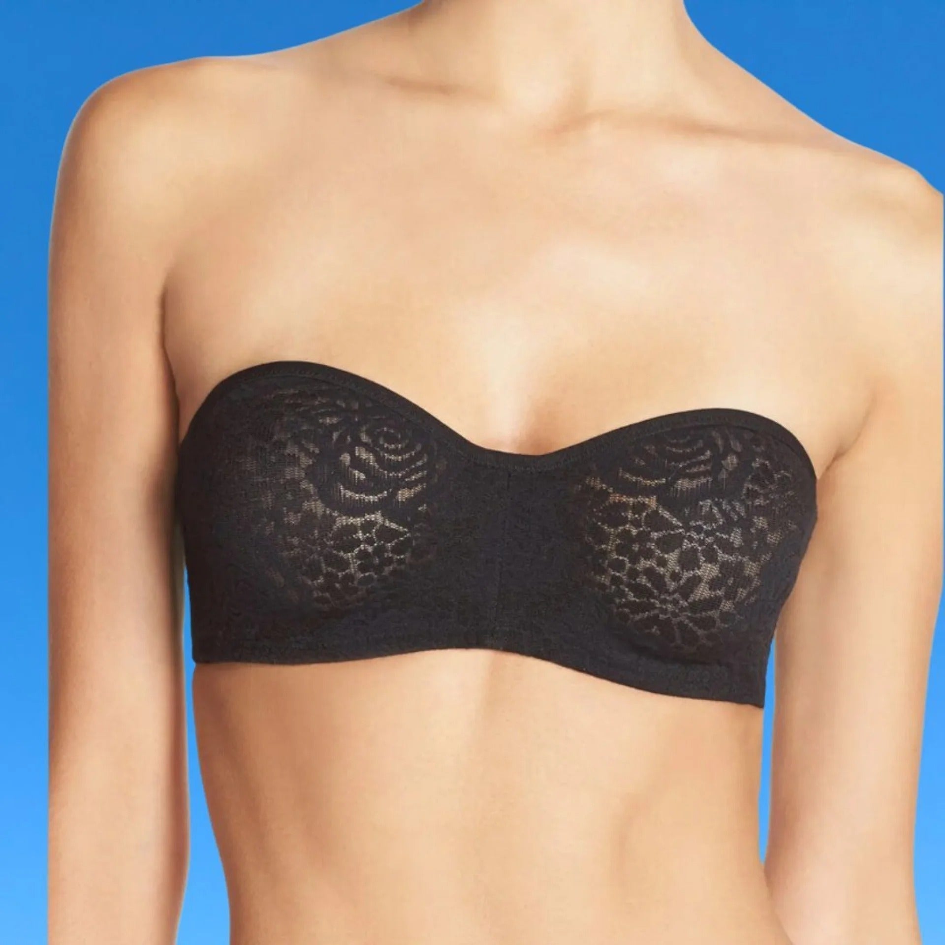 Strapless lace bandeau bra shown connected  precocious    assemblage  mannequin against a plain background, suitable for buying  articles