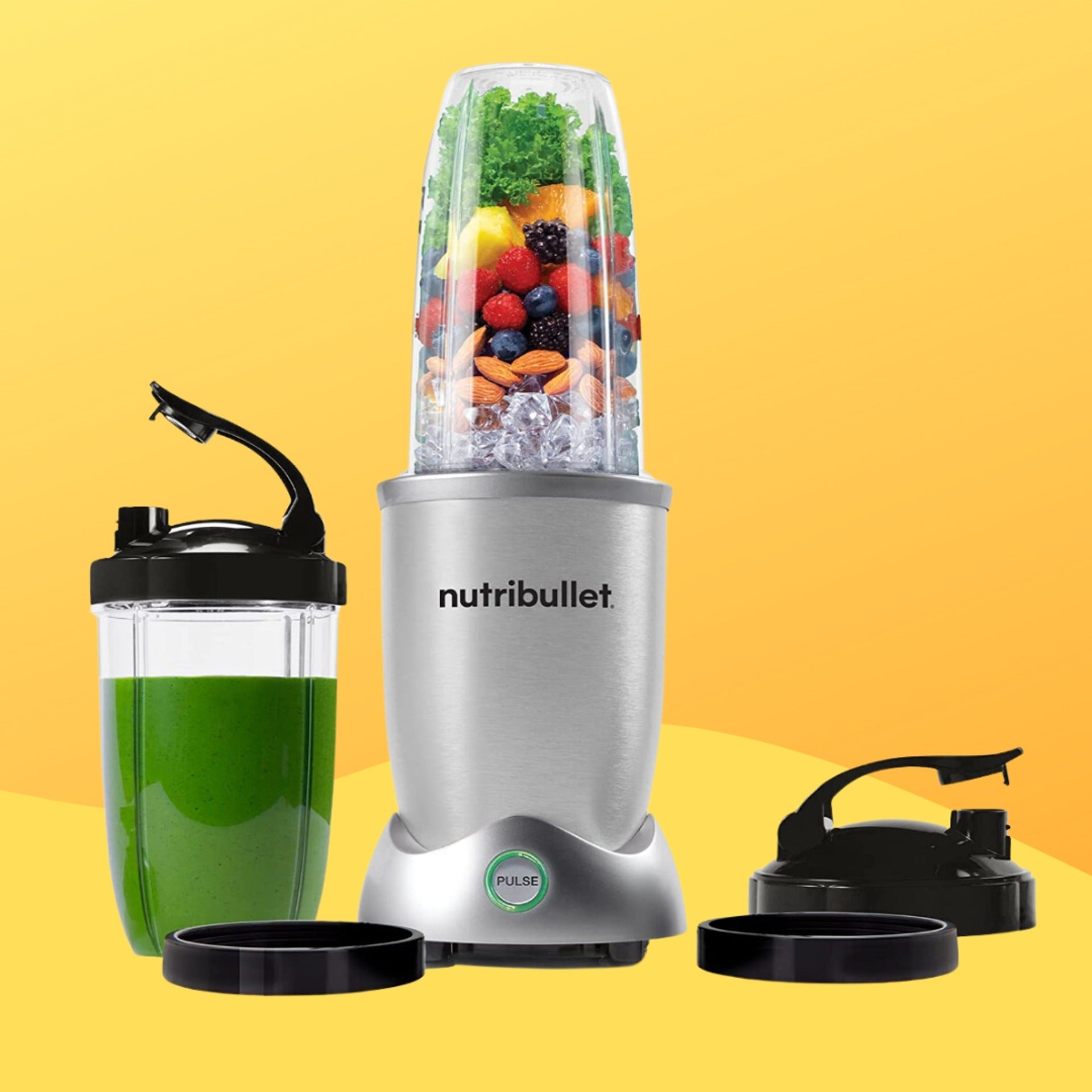 Nutribullet blender acceptable with cups, lids, and blades; 1 cupful filled with fruits, veggies, and nuts, different with a greenish smoothie