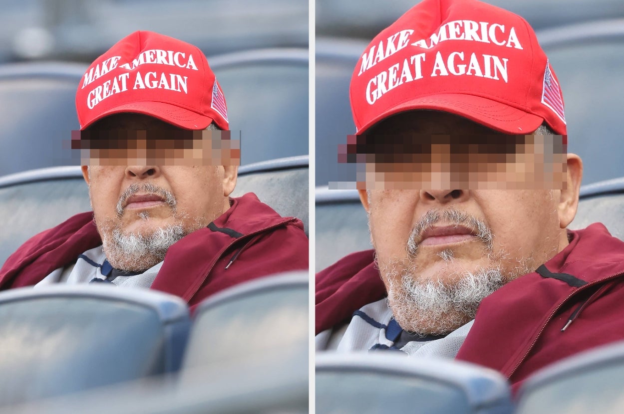 Person in a jacket and "Make America Great Again" cap, pixelated face, sitting in a stadium