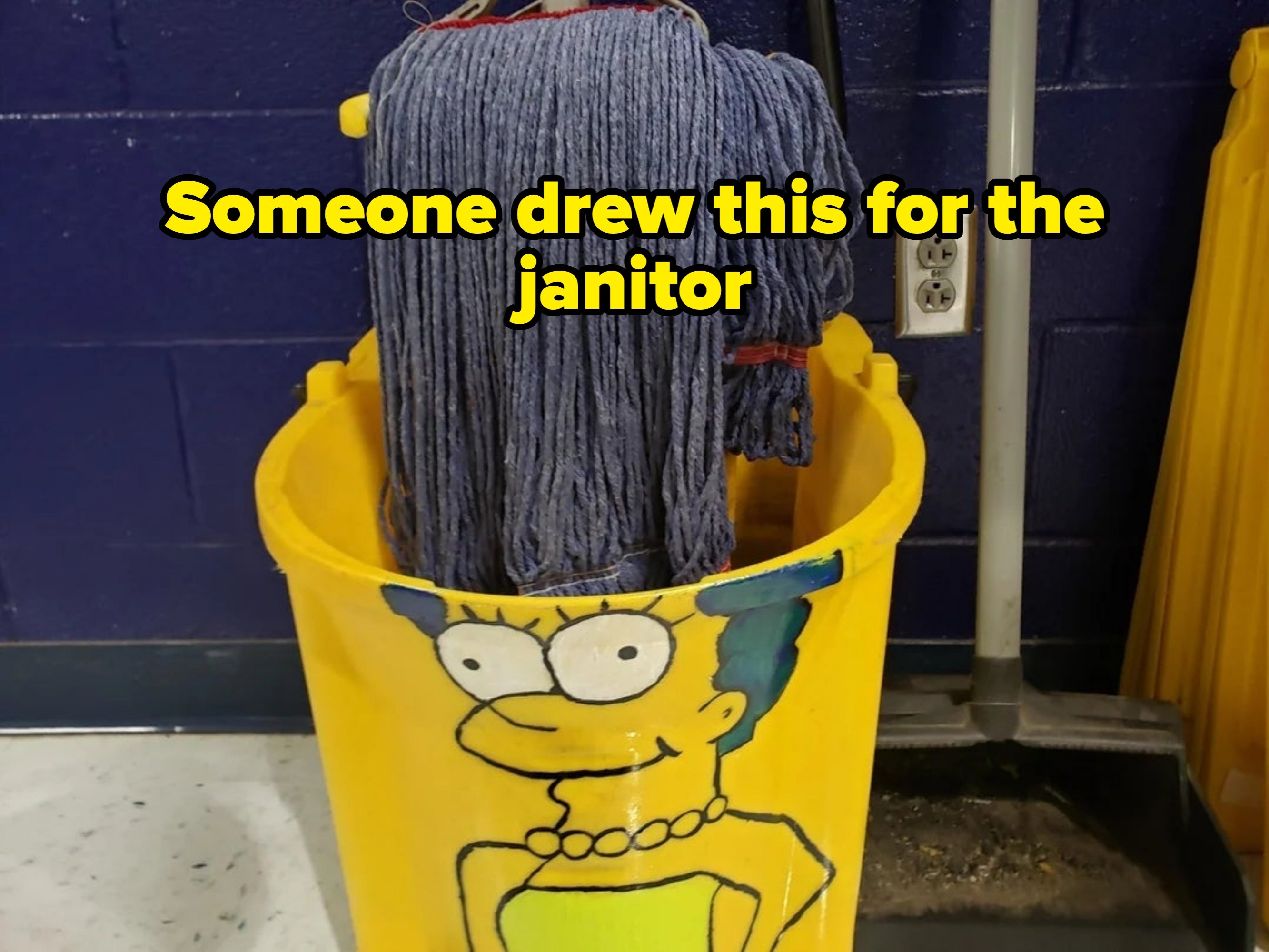 Mop in a bucket with a cartoon face resembling Marge Simpson, creating a humorous visual likeness