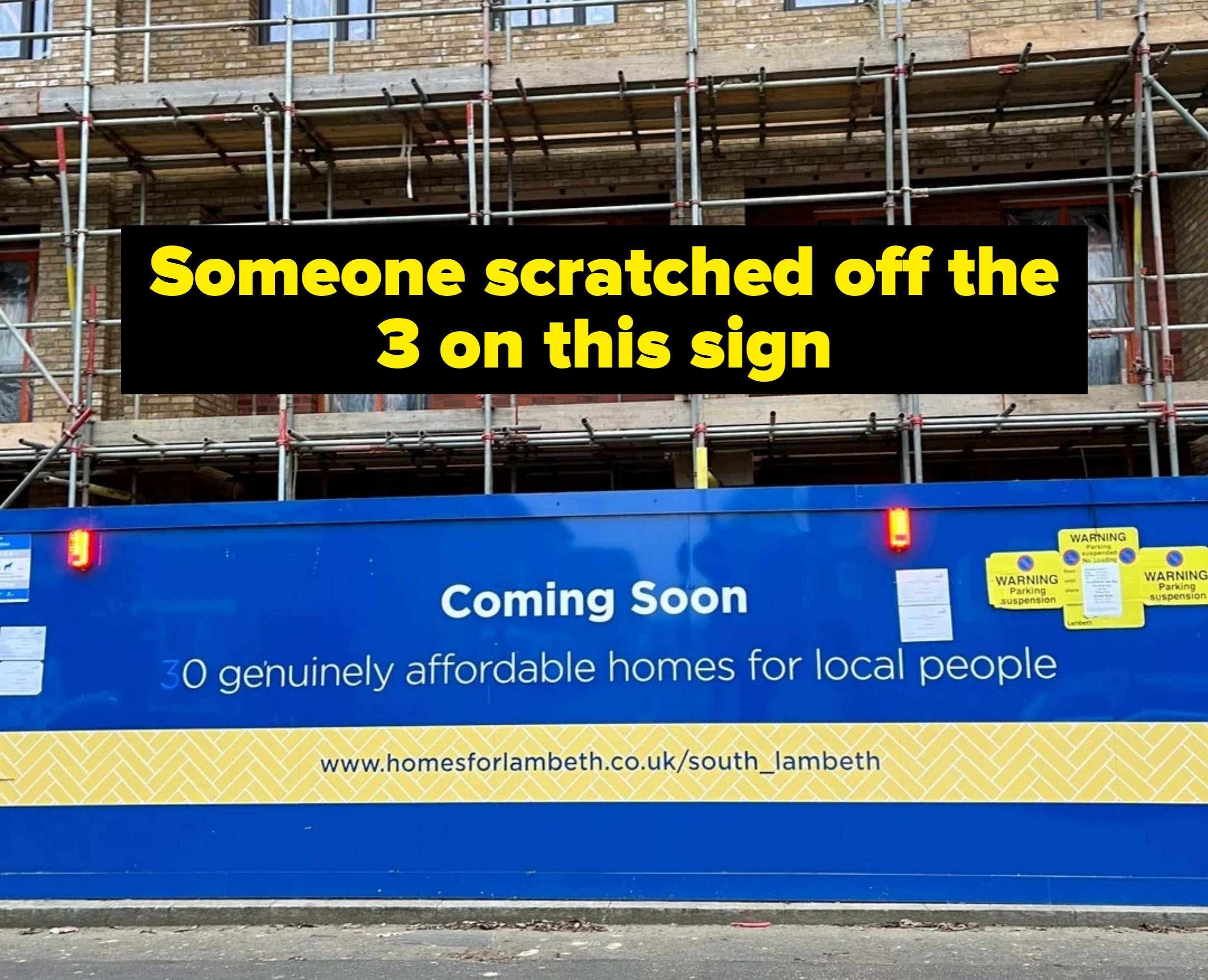 Billboard on construction site: "Coming Soon. 30 genuinely affordable homes for local people." Website link: homesforlambeth.co.uk/south_lambeth