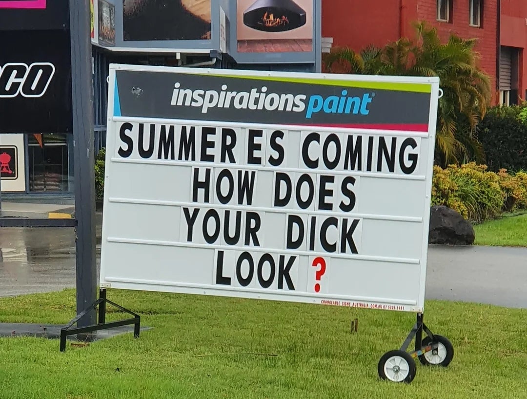 Sign outside a paint store reads: "SUMMER IS COMING HOW DOES YOUR DECK LOOK?" (Deck is humorously misspelled as "DICK")