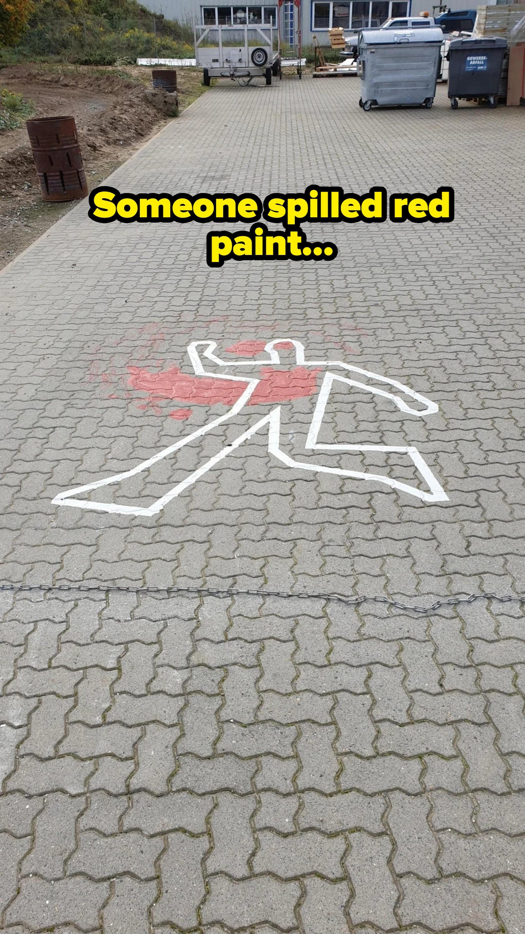 Chalk outline of a person on a paved surface, with red markings suggesting impact or distress