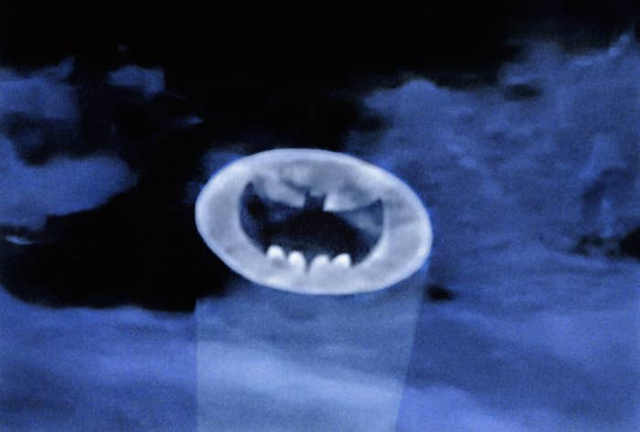 Bat-Signal shining successful  the nighttime  sky, a classical  awesome    utilized  to summon Batman