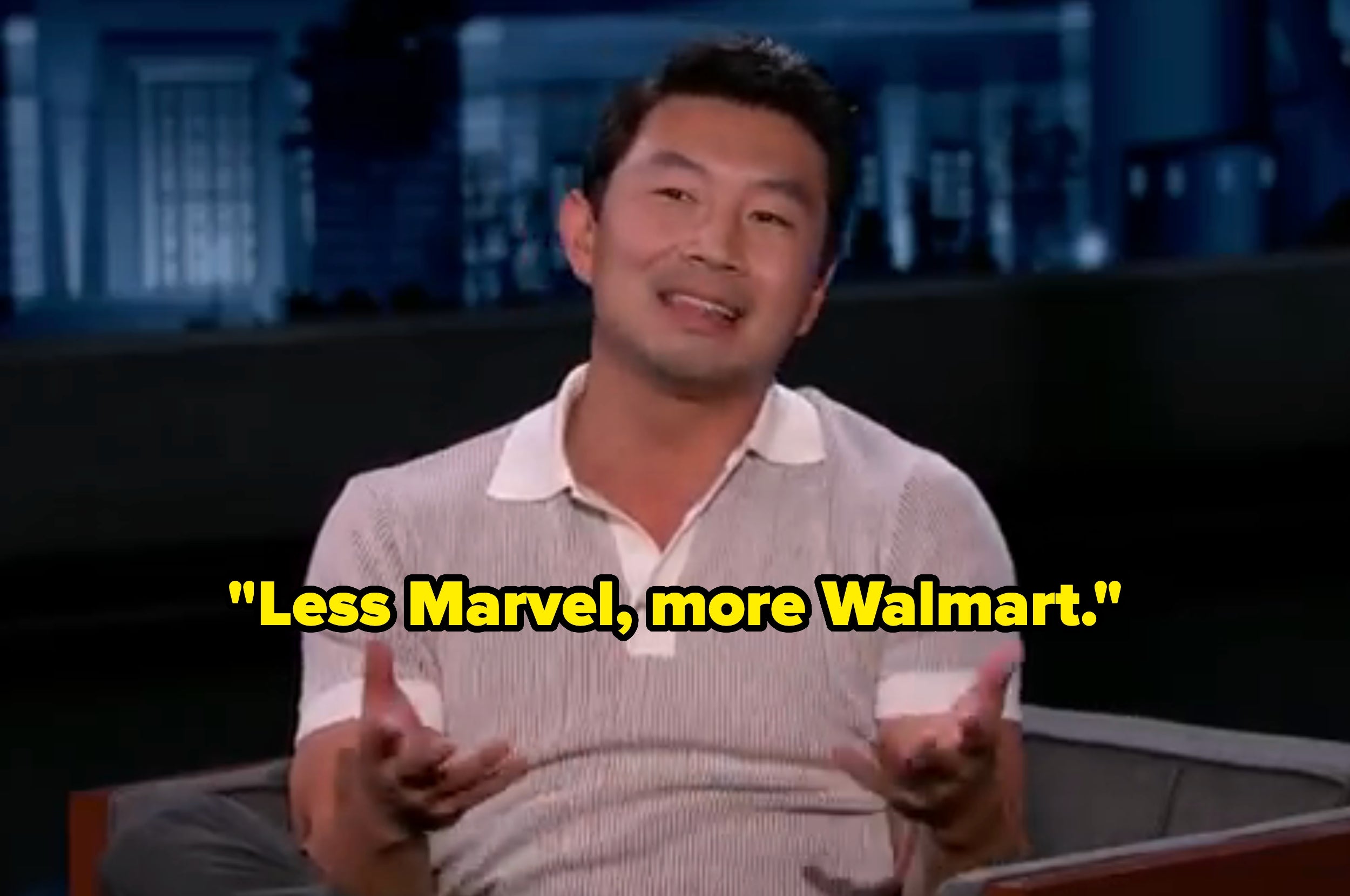 Person smiling, sitting connected  a speech   amusement   set. Text overlay says, "Less Marvel, much  Walmart."