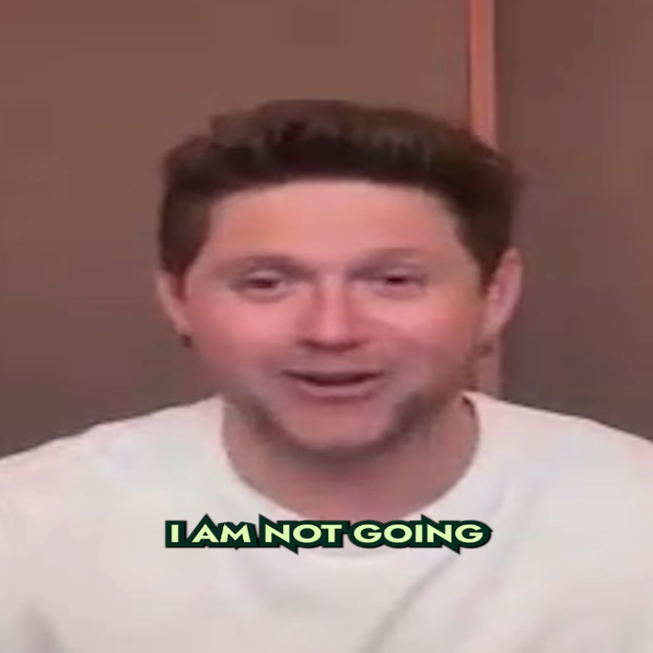 Person in a white shirt smiling with text overlay: "I am not going"