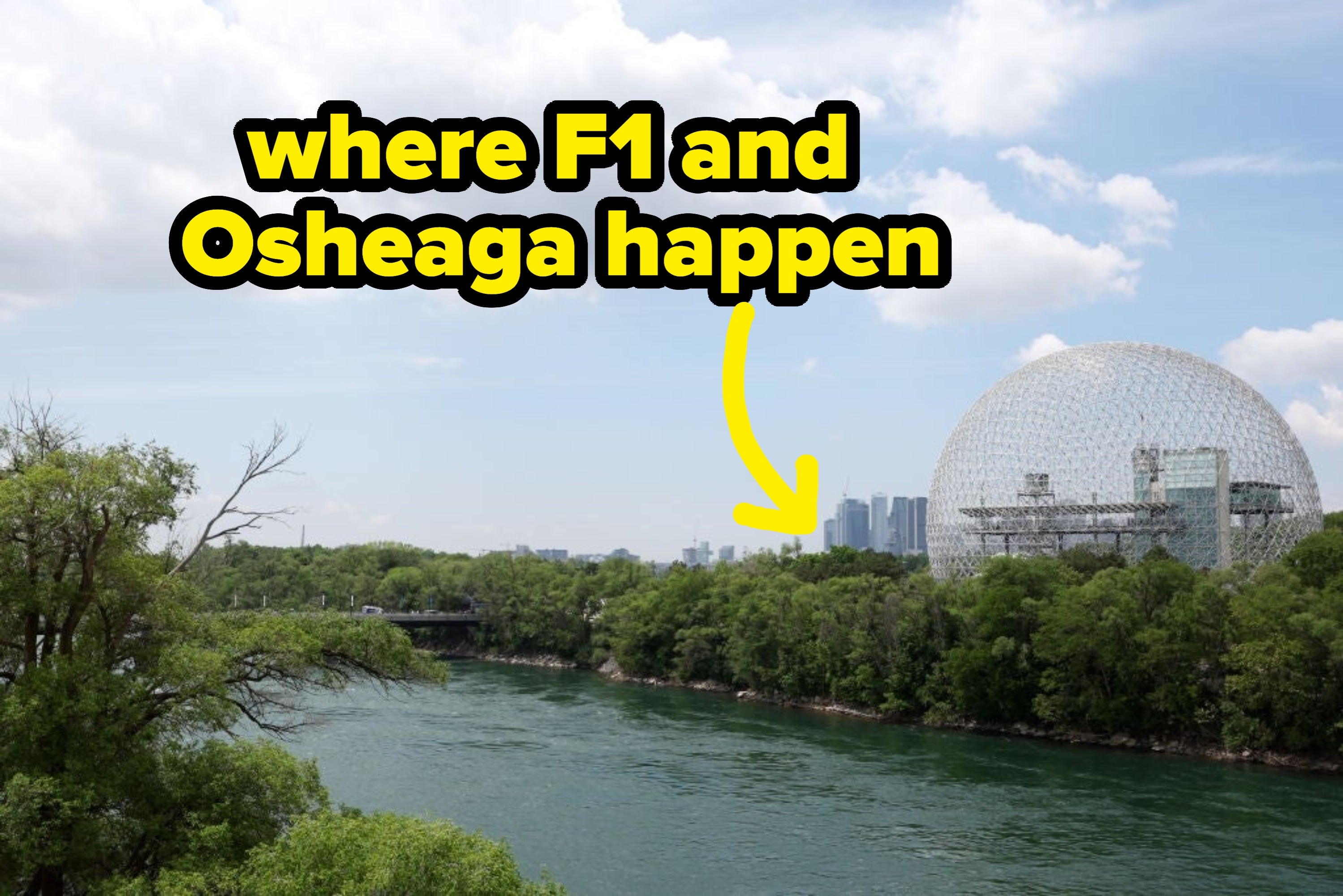 Geodesic dome by a stream with trees and metropolis skyline successful the inheritance nether a partially cloudy sky