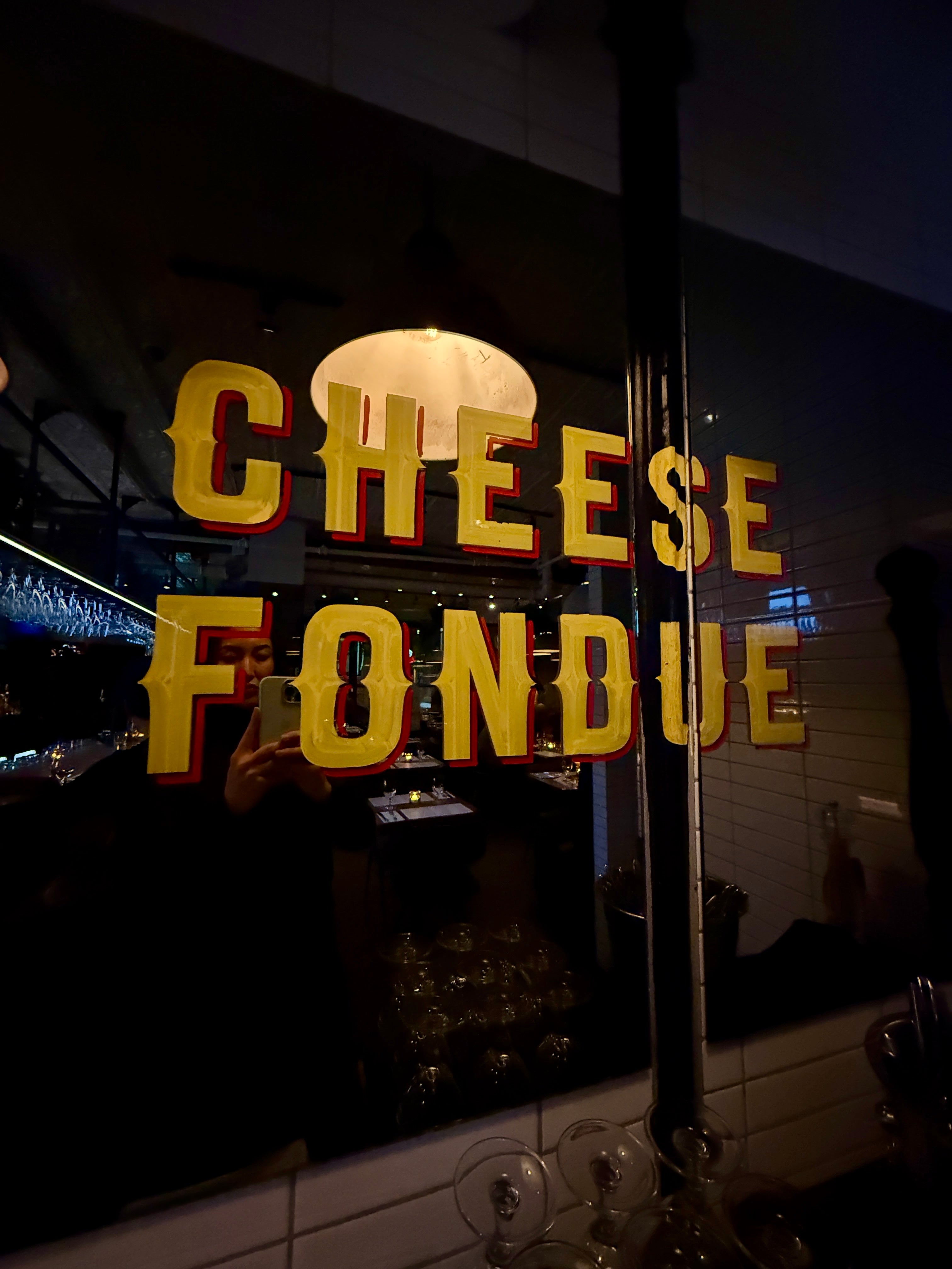 "Cheese Fondue" motion successful a cozy edifice mounting with dim lighting