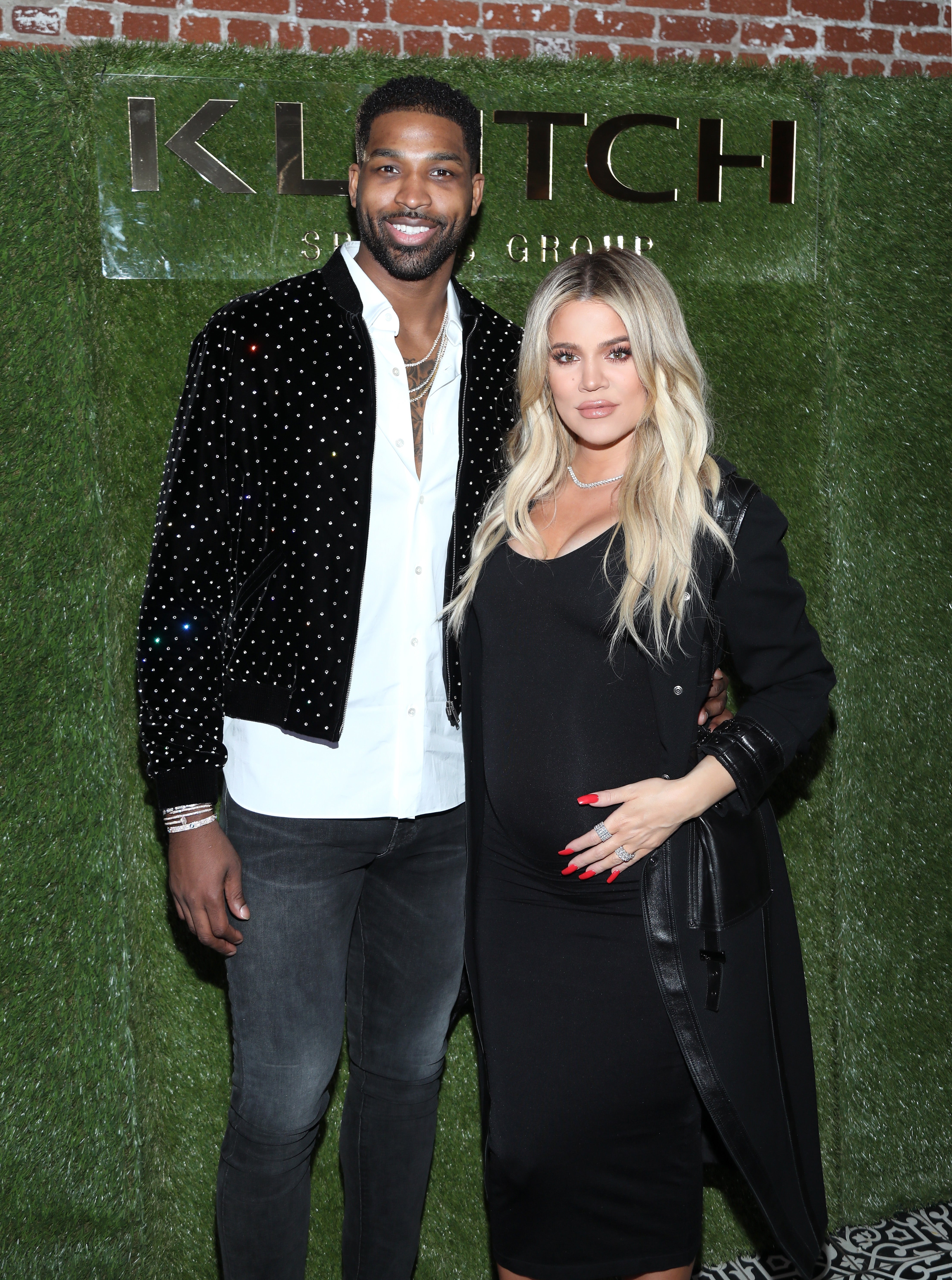 Tristan and a large   Khloe posing astatine  an event