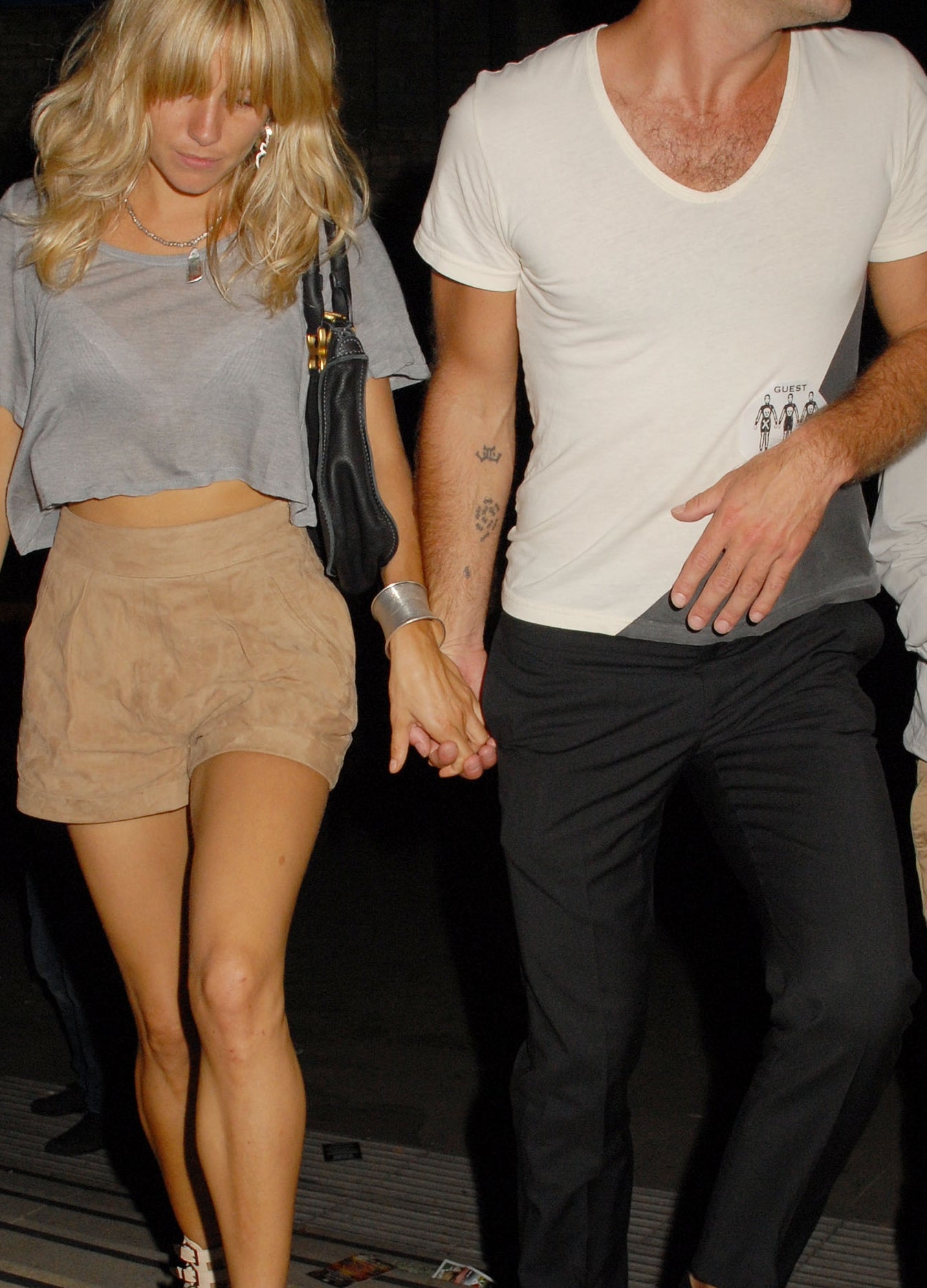 Jude Law and Sienna Miller walking manus  successful  manus  successful  casual clothes